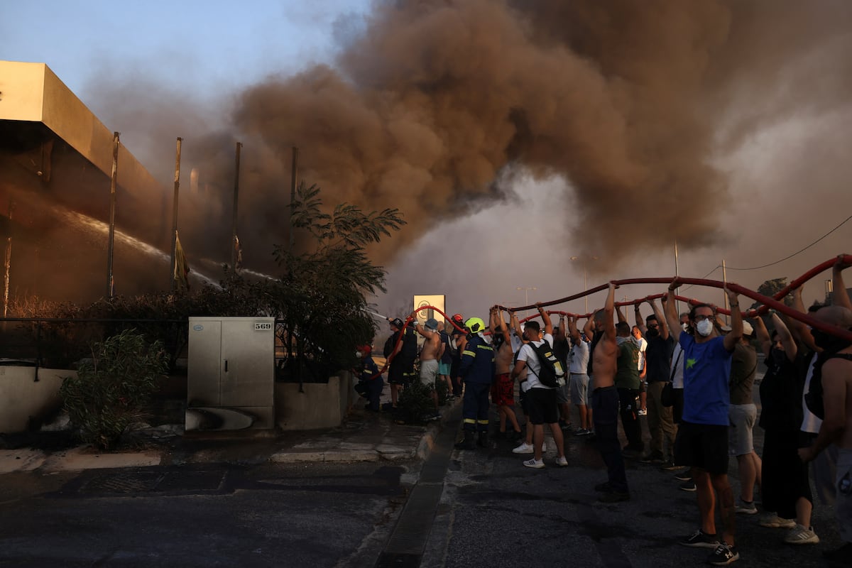 Greece: Woman dies in massive forest fire outside Athens | International