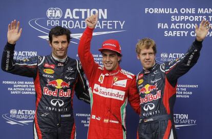 Alonso celebra su pole junto a Webber y Vettel