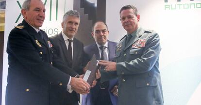 29/10/2018 De izquierda a derecha en la imagen: el DAO de la Policía Nacional, José Ángel González; el ministro de Interior, Fernando Grande-Marlaska; el director de ATA, Lorenzo Amor; y el DAO de la Guarcia Civil, Laurentino Ceña, durante los premios autónomos del año que entrega ATA. ECONOMIA ESPAÑA EUROPA RICARDO RUBIO - EUROPA PRESS