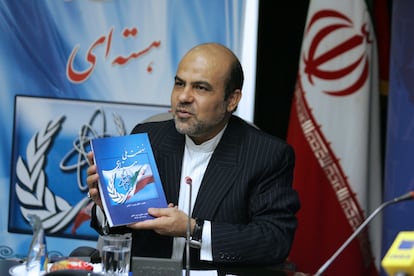 In this picture released on Tuesday, Oct. 14, 2008, by Islamic Republic News Agency, IRNA, Ali Reza Akbari speaks in a meeting to unveil the book 'National Nuclear Movement' in Tehran, Iran.