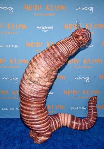 "A little color, a little paint, makes you what you ain't," Klum said on Instagram in 2022, before revealing herself as a giant worm. It was one of her most talked-about costumes, and it took her 10 hours to pull it off, thanks to pros such as Mije Marino (a professional prosthetic makeup artist), artist Mike Fontaine (who has worked on sci-fi films) and Jerry Constantine (a special effects makeup specialist).