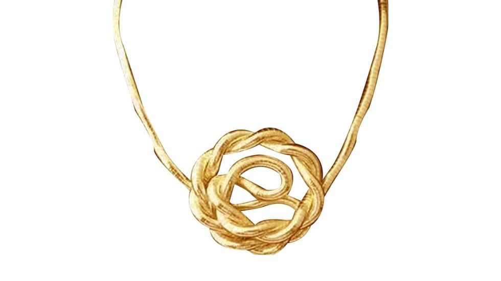 Collar flexible viral en color dorado.