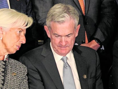 El presidente de la Fed Jerome Powell en julio de 2018 junto a Chirstine Lagarde.  