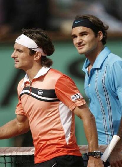 Robredo y Federer, al final del partido