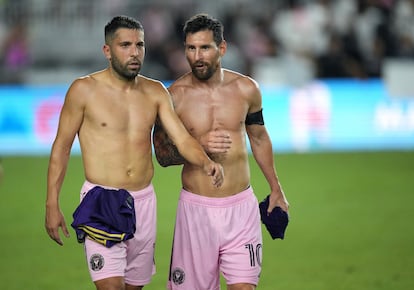 Inter Miami CF forward Lionel Messi (10) and defender Jordi Alba (18) look on after the match against Orlando City SC at DRV PNK Stadium.