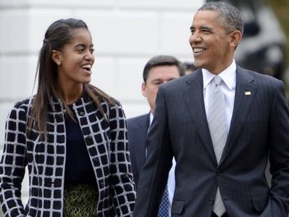 Barack Obama, con su hija Malia. 