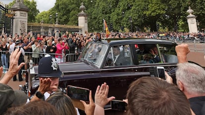 After being proclaimed king on Saturday, Charles III waves to the crowd gathered at the gates of Buckingham Palace as he arrived at the official residence. 