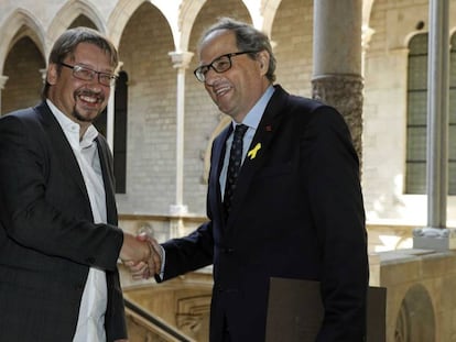 El presidente Quim Torra y el líder de los comunes, Xavier Domènech, este mediodía en la Generalitat