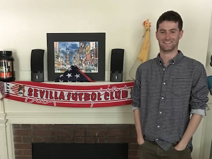 Harvard student Chris Ulian at his digs, with Sevilla FC scarf.