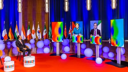 Angela Merkel y Mario Draghi, en las pantallas del foro Soluciones Globales durante su intervención conjunta el 28 de mayo.