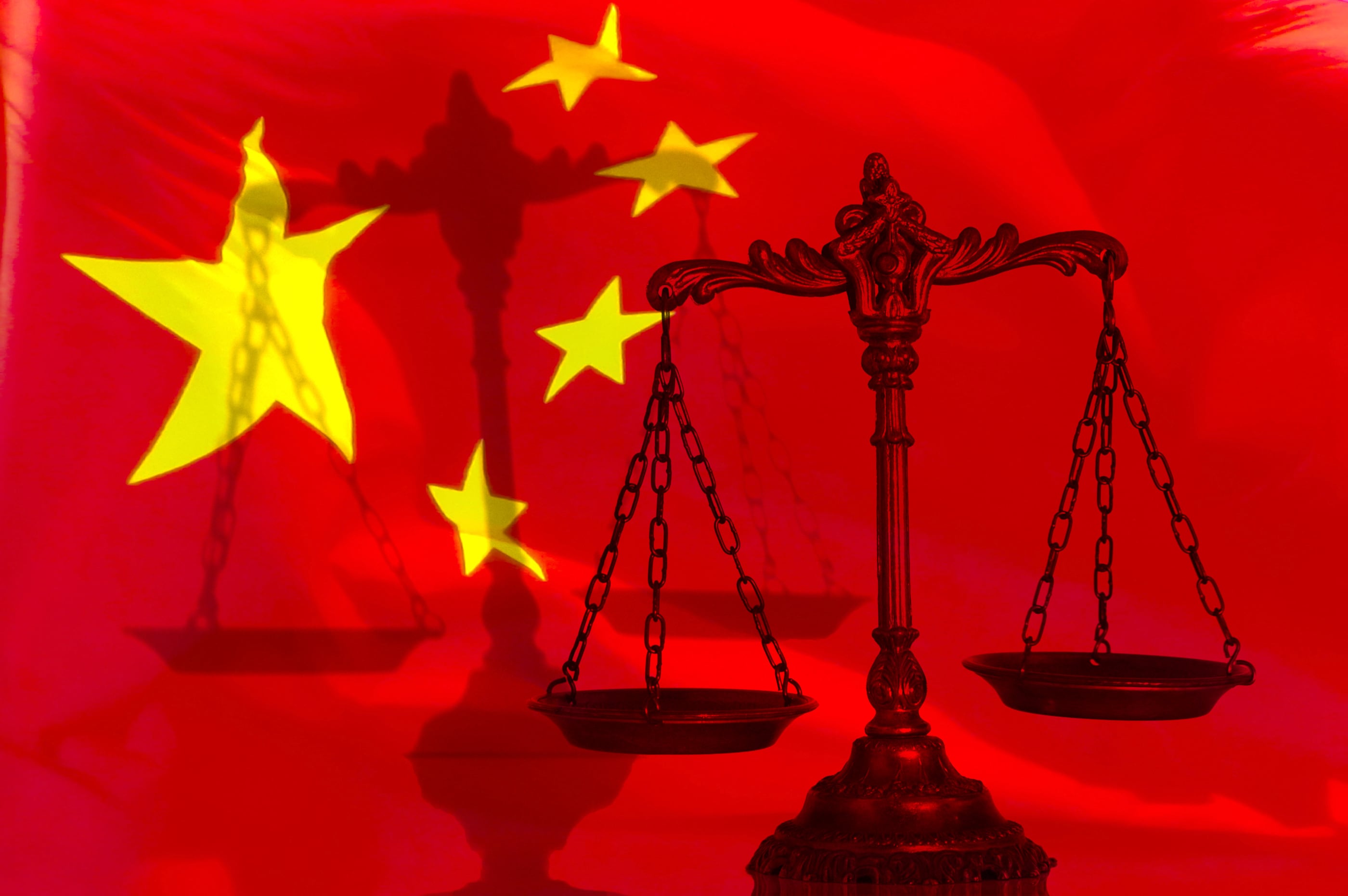 Decorative Scales of Justice with shadow on the Chinese flag