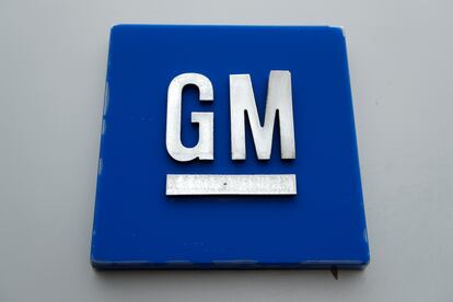 The General Motors logo is displayed outside the General Motors Detroit-Hamtramck Assembly plant, Jan. 27, 2020, in Hamtramck, Mich.