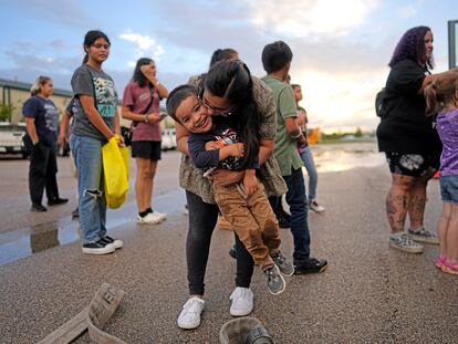 Gina Hernández and her son Noah at a neighborhood event in Colony Ridge, Texas; October 3, 2023.