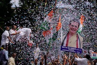 Supporters of India's main opposition party display a cutout photo of their leader Sonia Gandhi, as they celebrate early leads for their party in Telangana state elections in Hyderabad, India, on Dec.3, 2023.