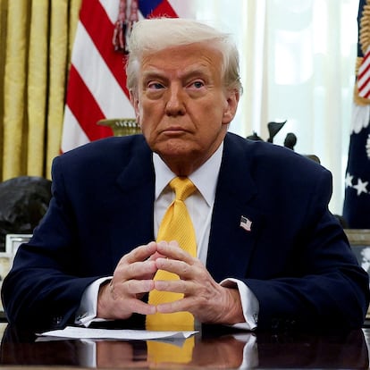 FILE PHOTO: U.S. President Donald Trump sits in the Oval Office of the White House in Washington, D.C., U.S., March 7, 2025. REUTERS/Leah Millis/File Photo