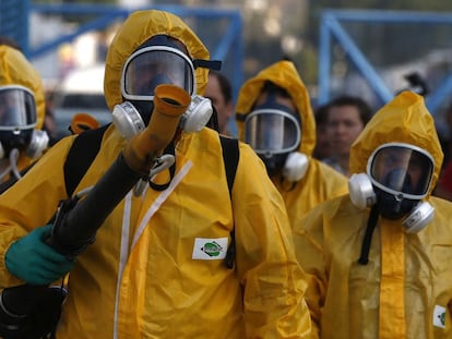 Rio health workers on Tuesday fumigate the Sambódromo, where Carnival celebrations will be held.