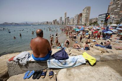 Tourists on the beach at Benidorm (Alicante).