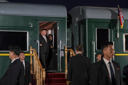 A handout photo made available by the Russian Ministry of Natural Resources and Ecology press service shows North Korea's leader Kim Jong Un (C) walking out of his train after arriving at the North Korea-Russia border in Khasan, some 125 km south of Vladivostok, Russia, 12 September 2023