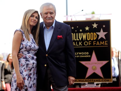 Jennifer Aniston poses with her father, actor John Aniston, at the actress's star unveiling on the Los Angeles Walk of Fame in February 2012.