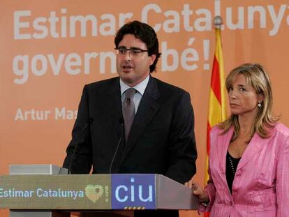 David Madí, en un acto de CiU, con Joana Ortega.