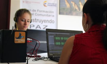 Journalists participate in a training session at a community broadcaster.