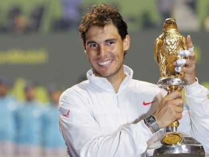 Rafael Nadal with the Qatar Open winner&#039;s trophy. 