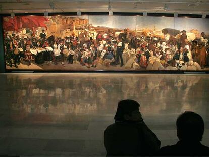 El cuadro <i>Castilla. La fiesta del pan,</i> el más grande de la muestra, en una vista de la sala de exposiciones del Centro Cultural Bancaixa.