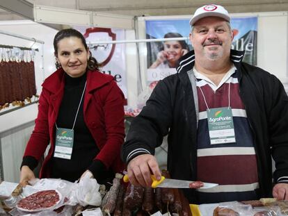Andreia y Paulo Colle manejan una empresa de productos de cerdo.
