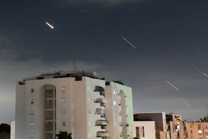 The Israeli Iron Dome air defense system launches projectiles to intercept missiles fired from Iran, in central Israel, on April 14.