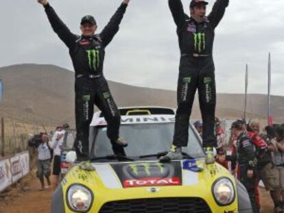 Nani Roma (r) and copilot Michel Perin celebrate their Dakar 2014 victory.