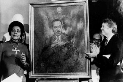 Coretta Scott King, widow of slain civil rights leader Martin Luther King Jr., speaks at an unveiling of a portrait of King by artist George Mandus, Feb. 18, 1974, and dedicated by Gov. Jimmy Carter.