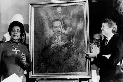 Coretta Scott King, widow of slain civil rights leader Martin Luther King Jr., speaks at an unveiling of a portrait of King by artist George Mandus, Feb. 18, 1974, and dedicated by Gov. Jimmy Carter.