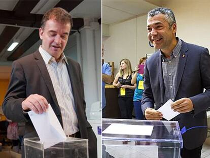 Alfred Bosch, a la izquierda, y Oriol Amorós, votando esta mañana.