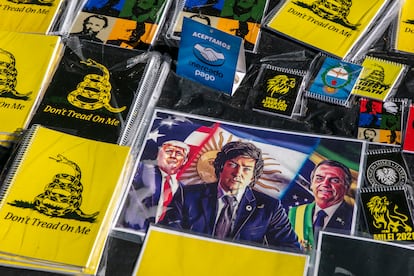 Stickers of Javier Milei, alongside images of Trump and Brazil’s former president Bolsonaro. 