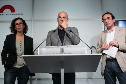 Rovira, Romeva y Rull en la rueda de prensa.