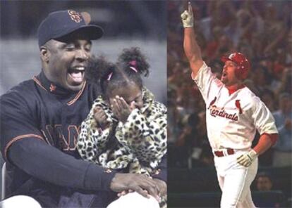 Barry Bonds, con su hija, a la izquierda, y Mark McGwire.