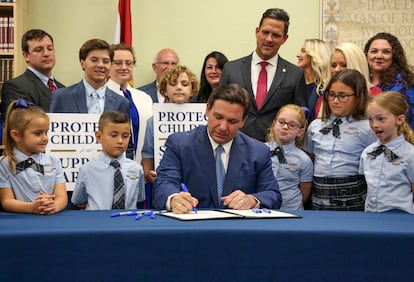 Florida Governor Ron DeSantis signs the Parental Rights in Education bill at Classical Preparatory school, on March 28, 2022, in Shady Hills, Florida.