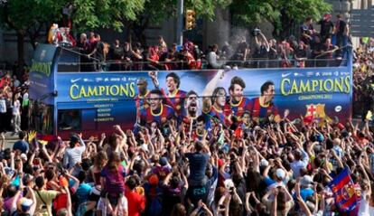 The Barcelona soccer team bus takes its victory tour of the streets of the Catalan capital.