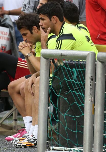 Cesc y Costa antes del entrenamiento