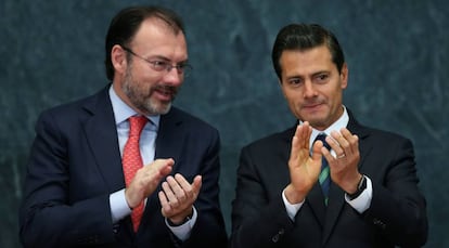 El exministro de Hacienda Luis Videgaray y el expresidente Enrique Peña Nieto, en un acto en 2017 en Ciudad de México.