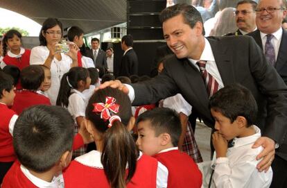 A photograph provided by the Mexican Presidency shows Enrique Peña Nieto greeting a group pf schoolchildren earlier this month.