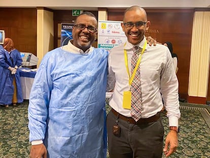 Dr. Bushra Ibnauf Sulieman, a Sudan-born American citizen, left, posing for a photo with Dr. Mohamed Eisa.