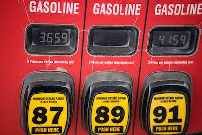 The prices of the various grades of gasoline available are displayed electronically on a pump at a filling station on Sept. 18, 2023, in Newcastle