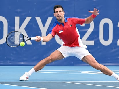 Serbian tennis player Novak Djokovic in action against Germany's Jan-Lennard Struff during their Men's Singles 2nd Round tennis match at the Olympic Games Tokyo 2020 at Ariake Tennis Park.