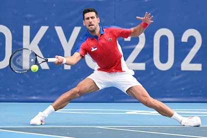 Serbian tennis player Novak Djokovic in action against Germany's Jan-Lennard Struff during their Men's Singles 2nd Round tennis match at the Olympic Games Tokyo 2020 at Ariake Tennis Park.