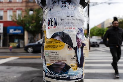 Signs in English and Spanish on a streetlight in Bushwick, New York, on May 23, 2024.