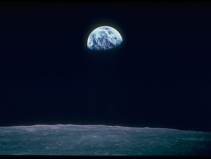 View of Earth taken from 'Apollo 8' with the curve of the Moon in the foreground.