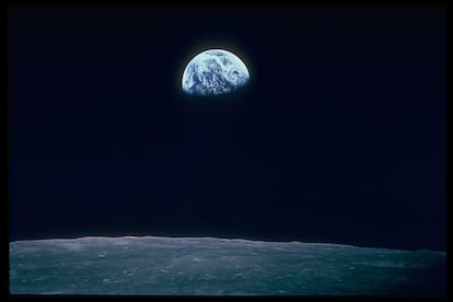 View of Earth taken from 'Apollo 8' with the curve of the Moon in the foreground.