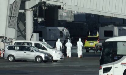 Japanese evacuees arrive in Tokyo from Wuhan on Wednesday.