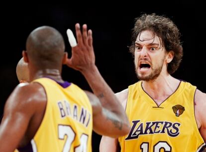 Los Angeles Lakers' Pau Gasol celebrates with Kobe Bryant in the seventh playoff finals game against Boston Celtics last season.